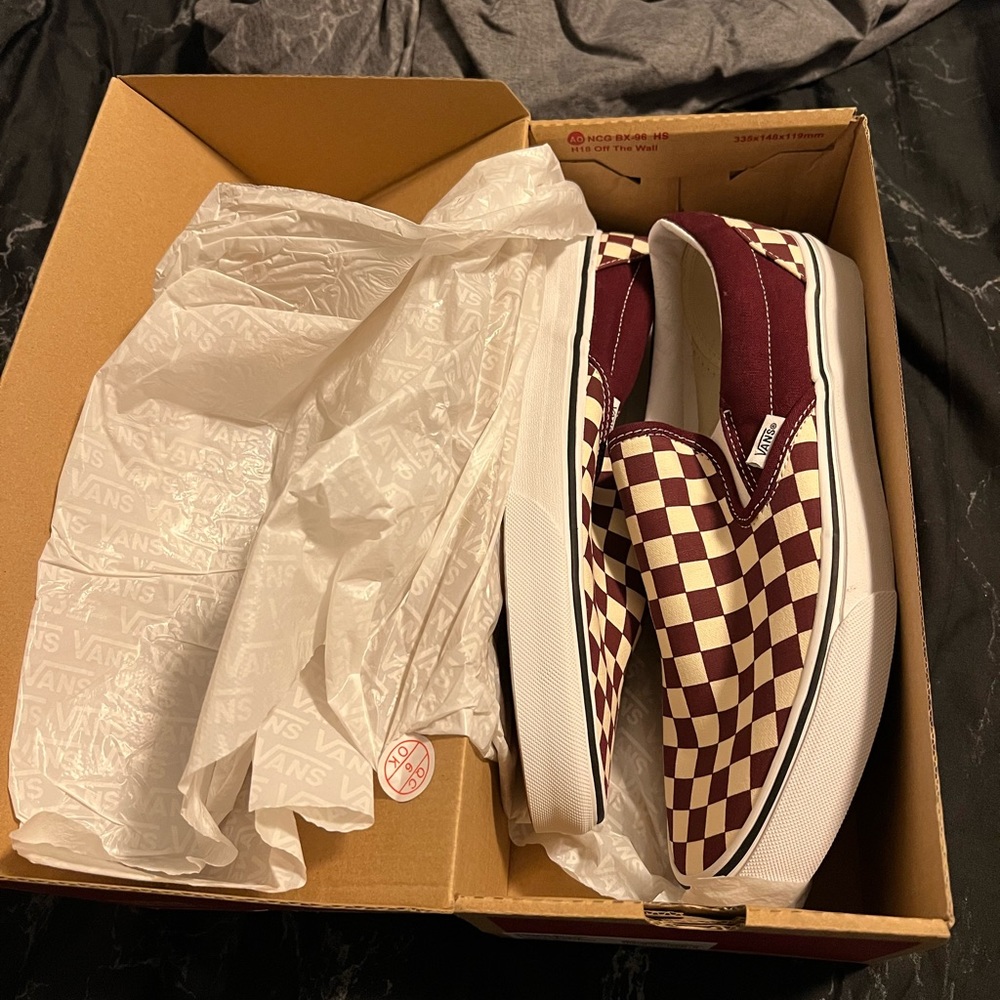 Never worn Vans slip ons